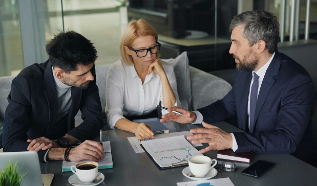 people working at the table